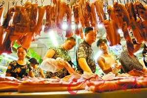广州6月份每天少吃2000头猪(图)