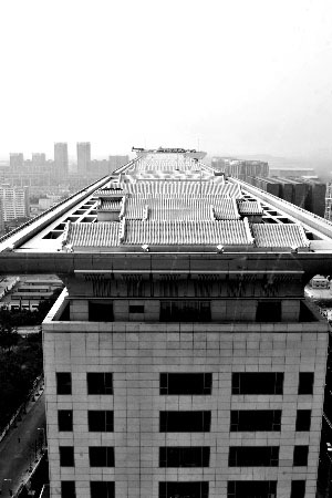 北京盘古大观违法加建12套空中四合院遭罚